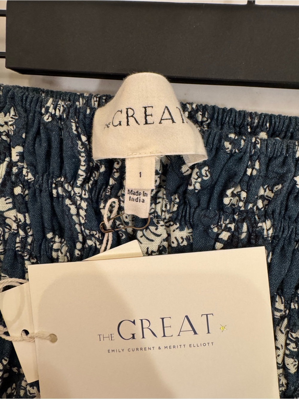 THE GREAT. Navy and White Floral Smocked Midi Skirt - Picture 5 of 5